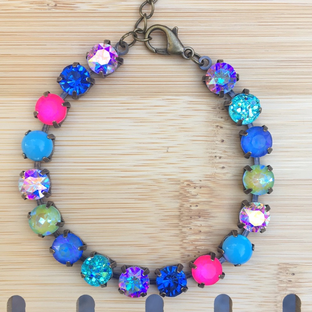 Hot pink + sapphire aurora borealis antique brass crystal tennis bracelet